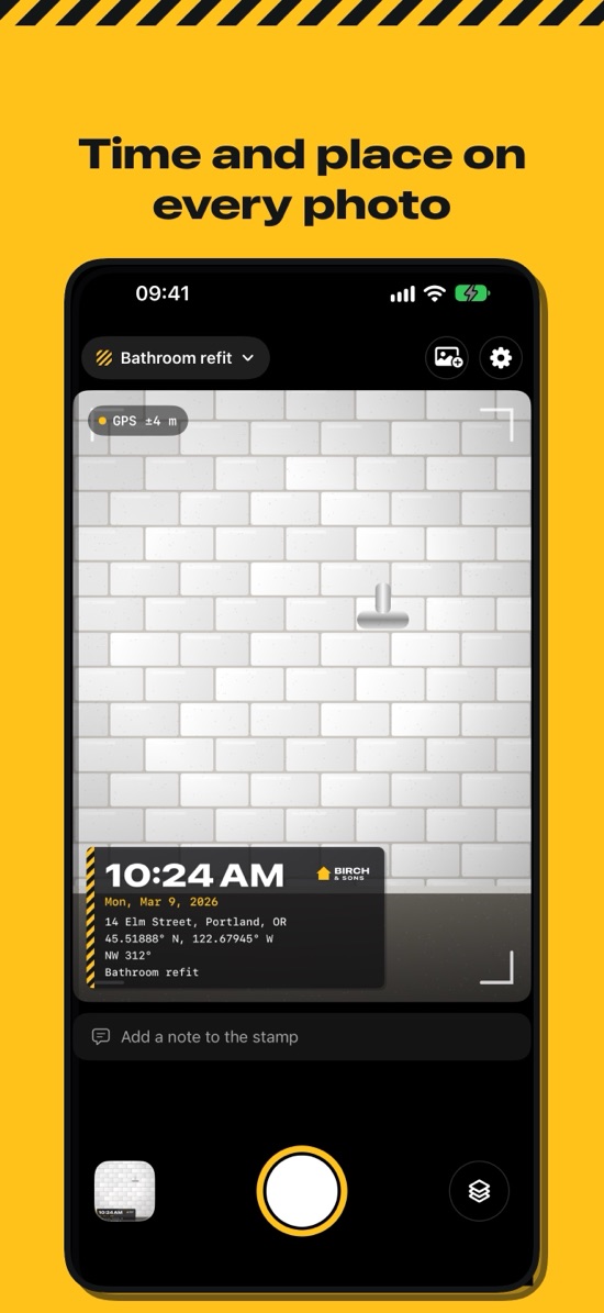 The camera with a data plate showing the time, date, address, coordinates and heading on a photo of a tiled bathroom wall